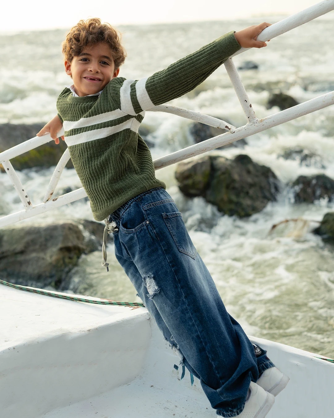 Palma boy exploring by the river